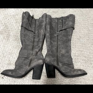 Grey high heeled leather boots